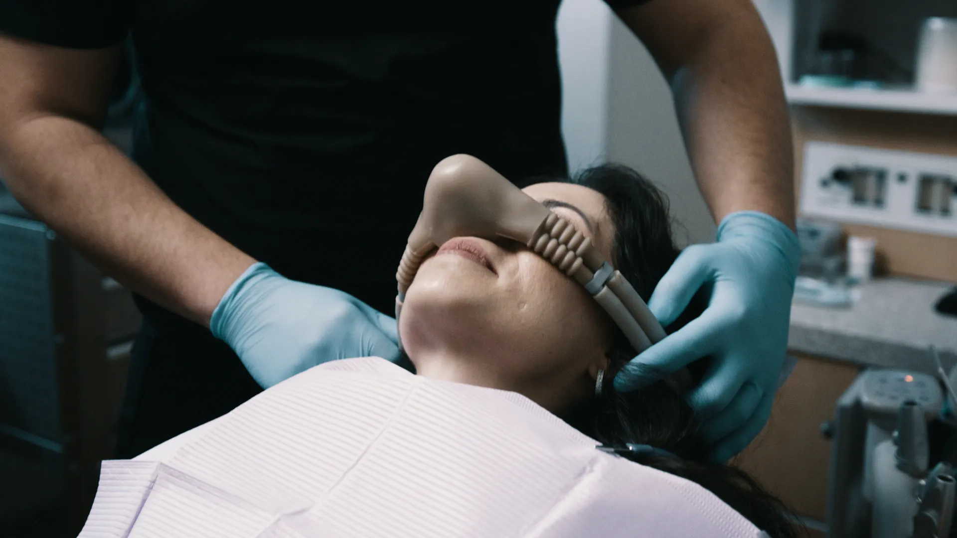 Patient resting comfortably during a sedation-assisted dental visit